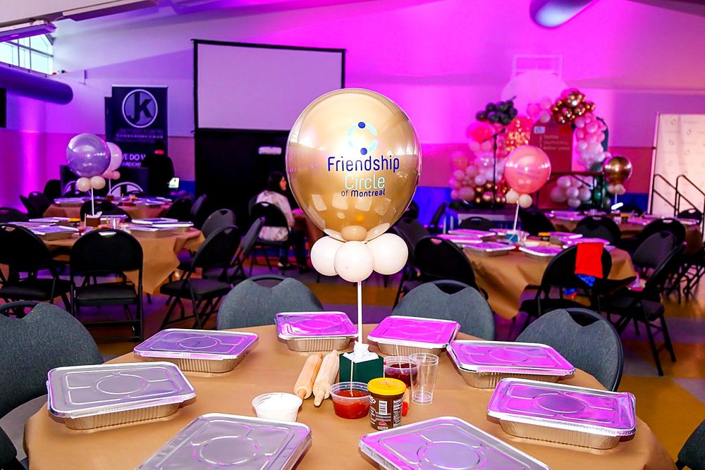 Decorated event table with balloons and details
