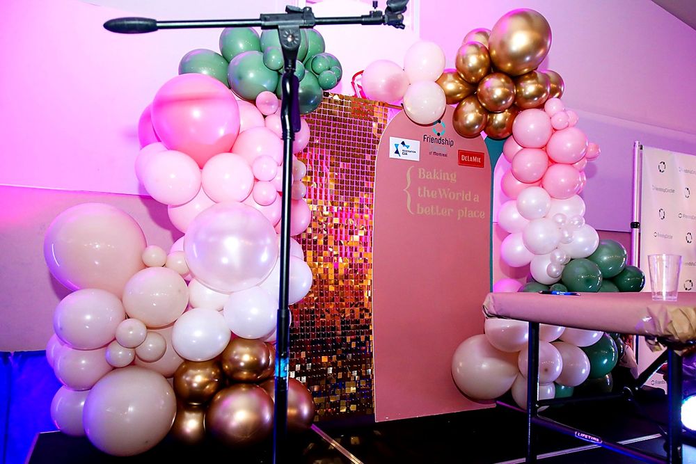 Gala stage with balloon garland and LED lighting
