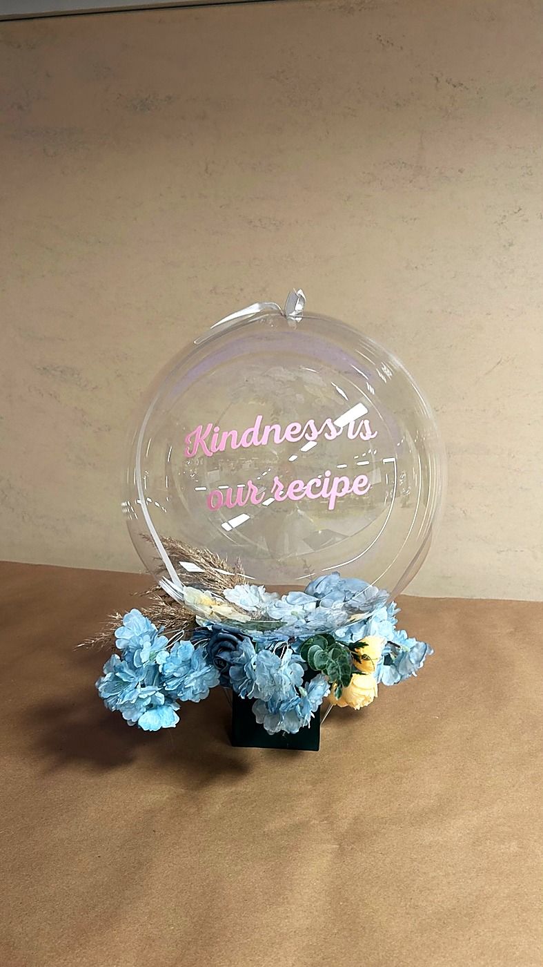 Transparent bubble balloon filled with flowers