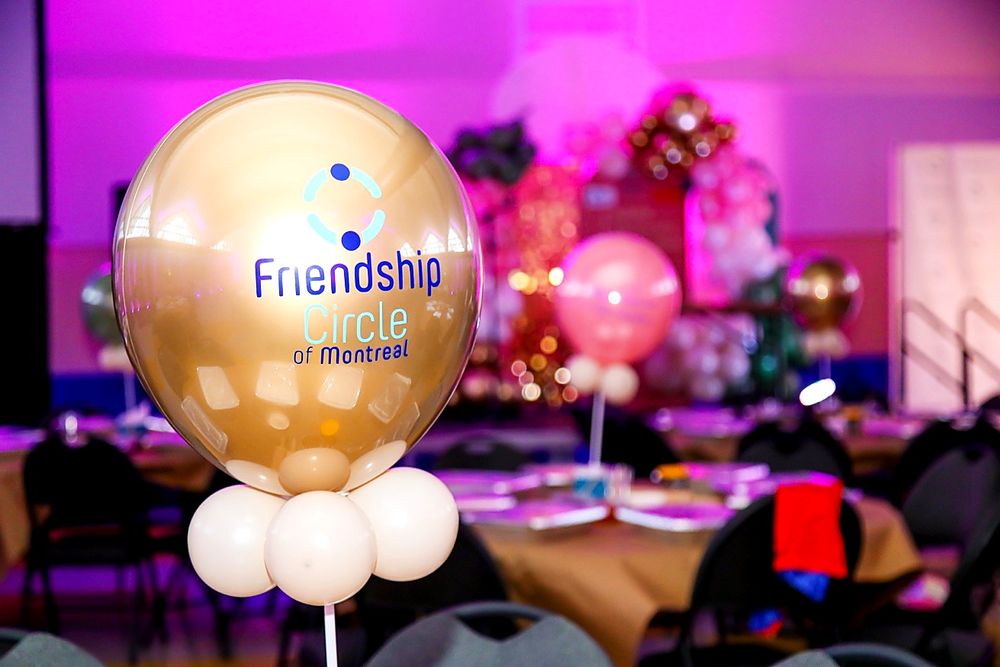 Dessert table styled with balloons and props